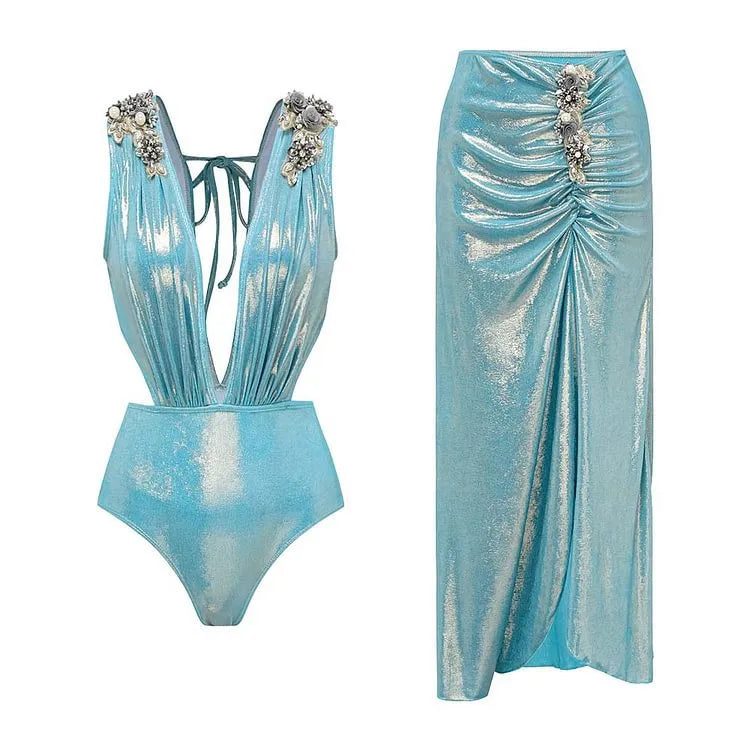 Maillot de bain 1 pièce effet sirène orné de pierre et de fleur.
